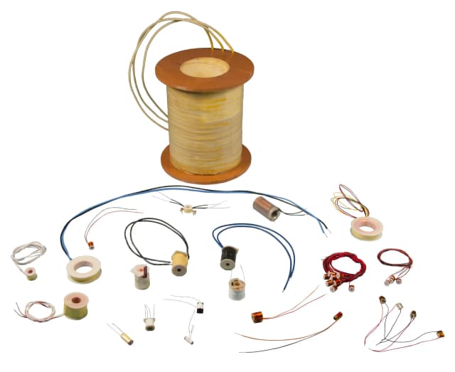A variety of different size bobbin wound coils with custom leads