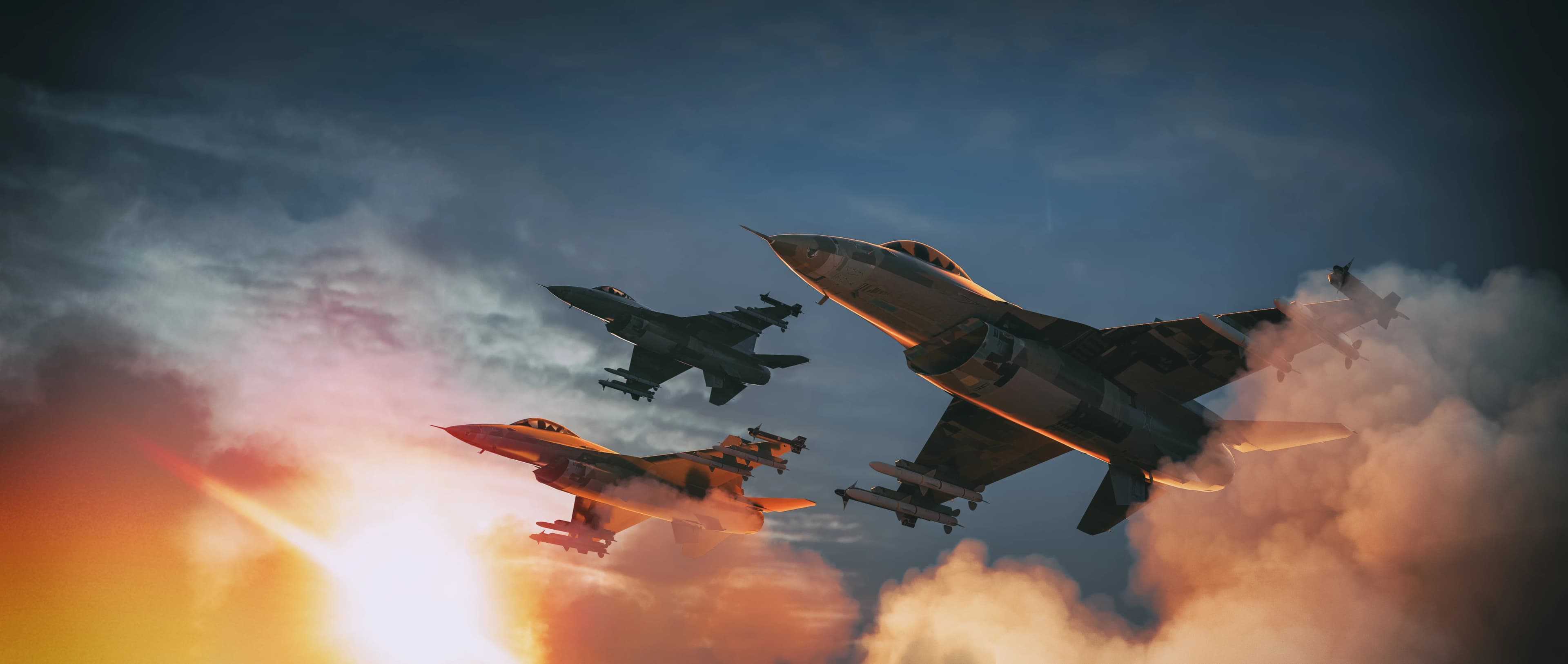 Three military fighter jets flying in air